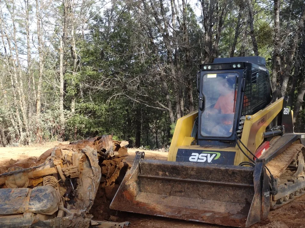 ASV skid steer clearing brush